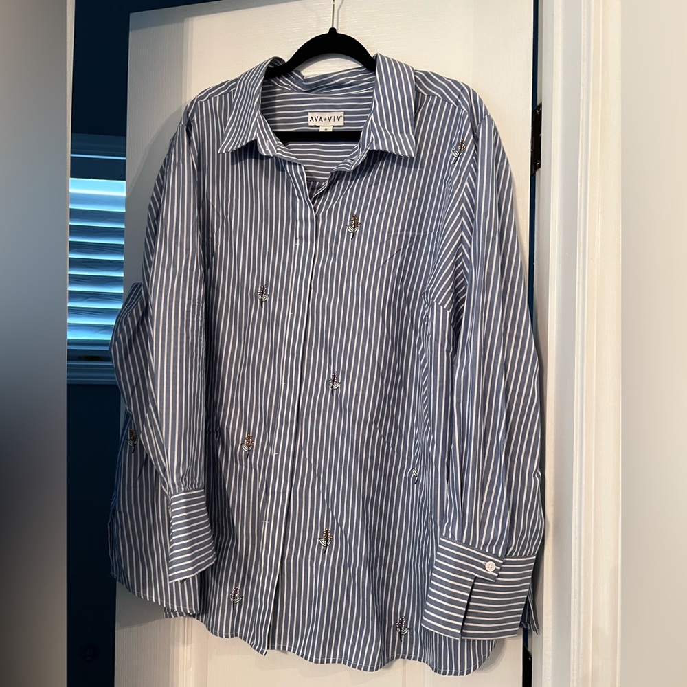 Blue and white striped blouse with flower print